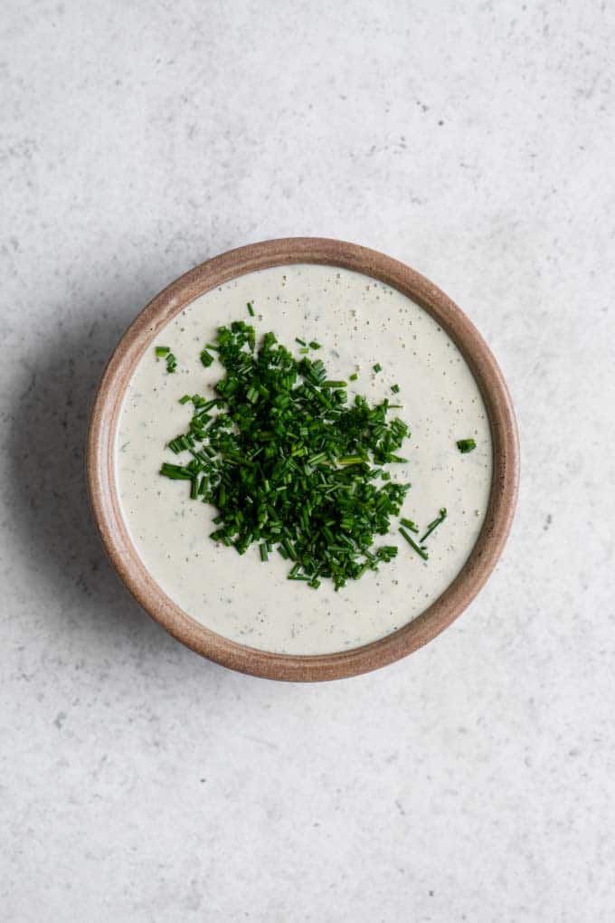 cashew ranch dressing with the fresh minced chives on top before being mixed in