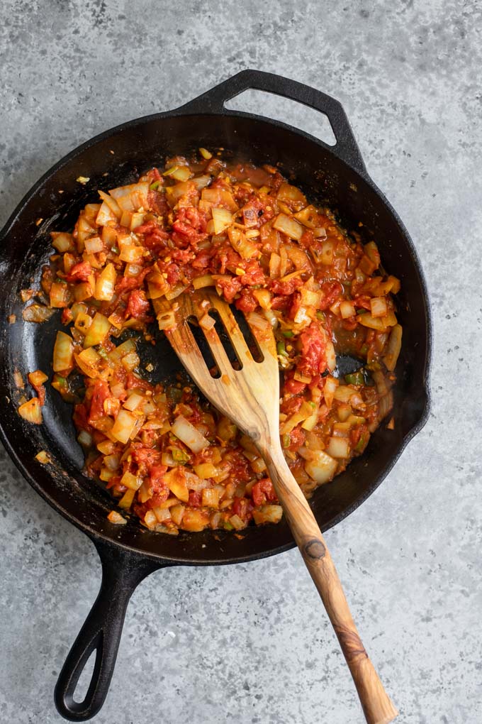 baingan bharta in skillet before eggplant is added