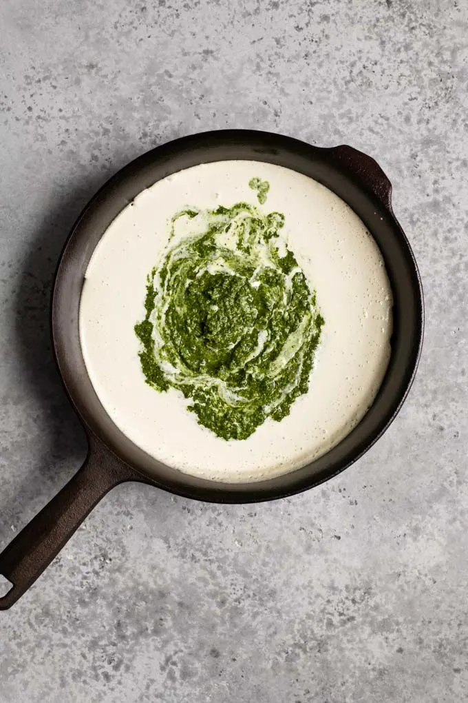 pesto swirled into cashew cream