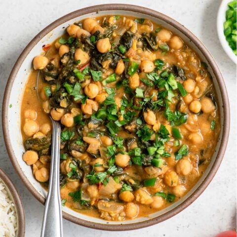 close up of chickpea and spinach curry