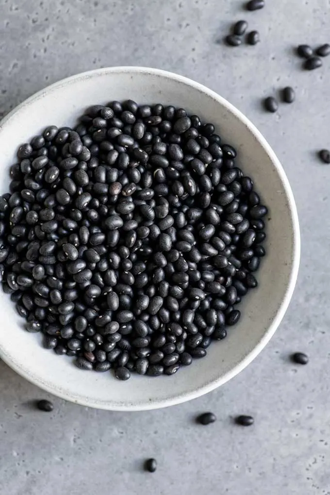 dried black beans in bowl