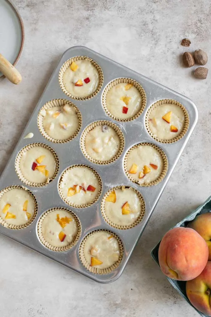 cupcake tin filled with batter