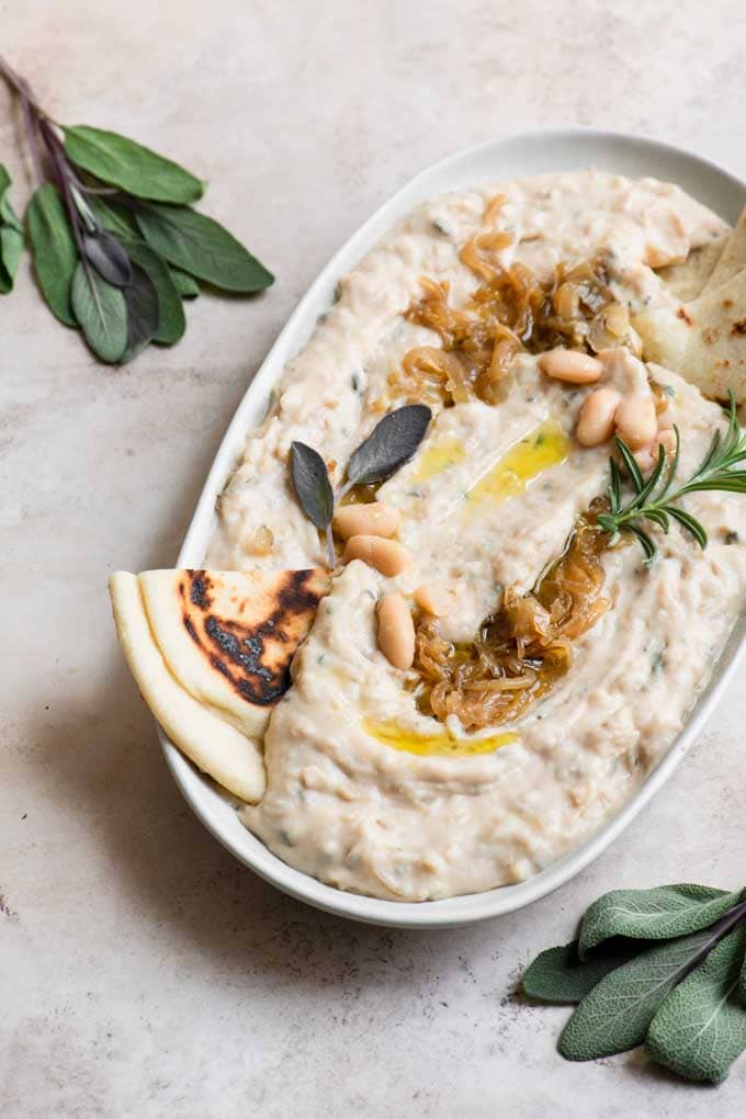 caramelized onion white bean dip with rosemary and sage