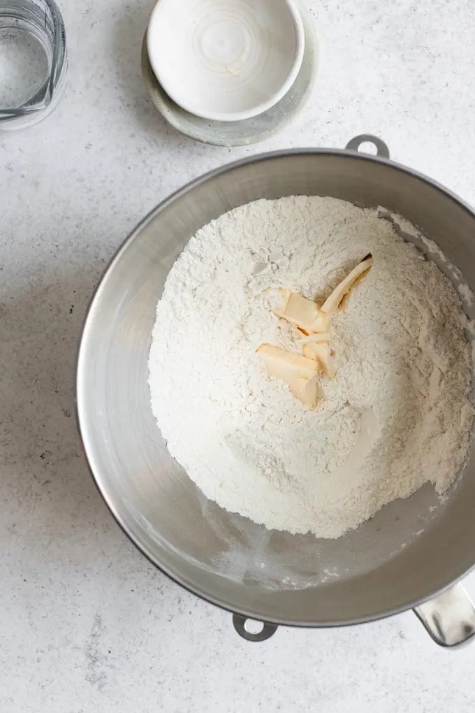 vegan butter being mixed into dry ingredients