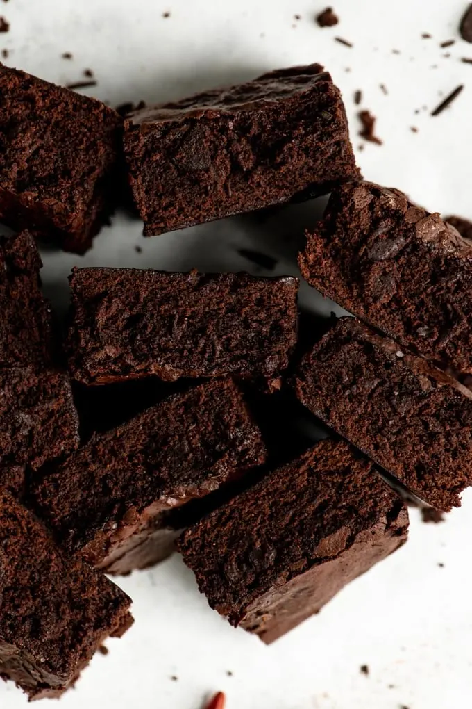 mexican chocolate brownies sitting on their side to show the chewy texture