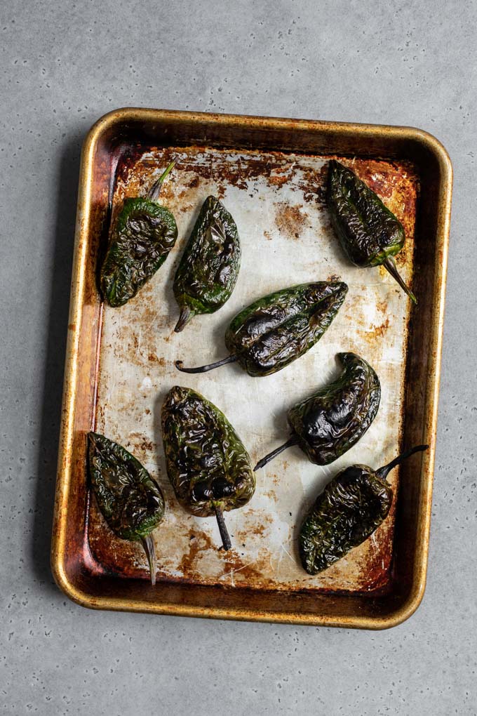 poblanos on baking sheet after roasting