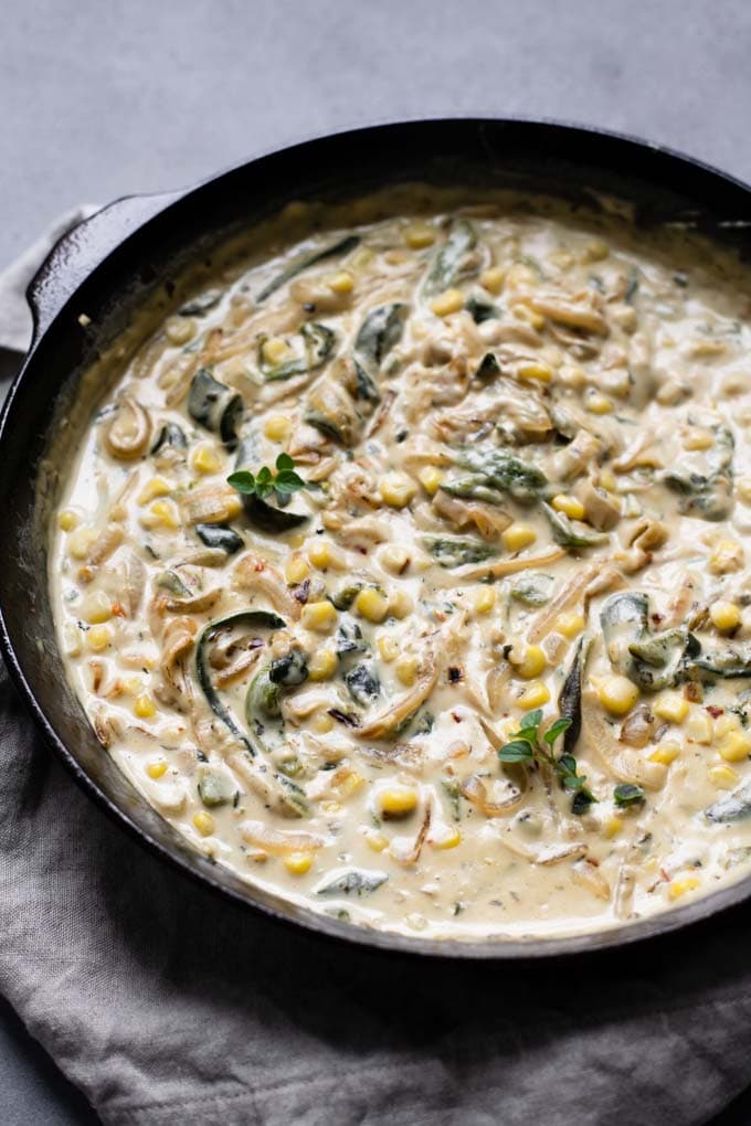 vegan rajas con crema in cast iron skillet