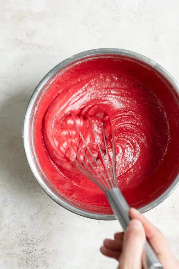 vegan red velvet batter mixed together with a whisk