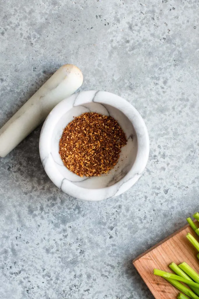 sichuan peppercorn ground by mortar and pestle