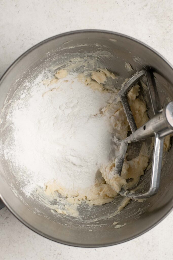 fine sugar added to whipped fat in mixing bowl
