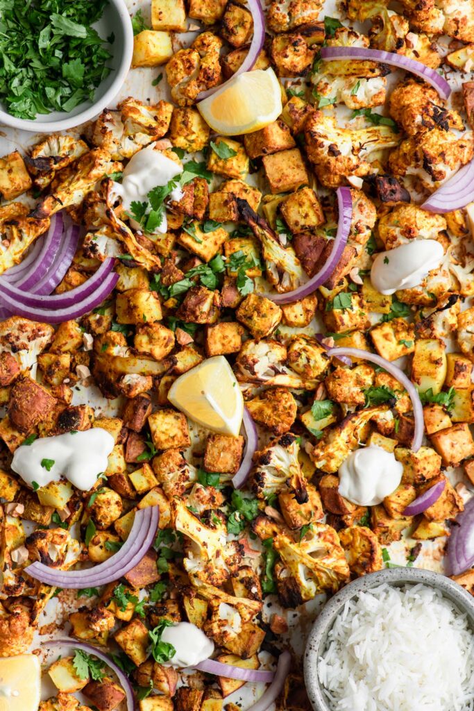 baked tandoori sheet pan with tofu, cauliflower, and potato