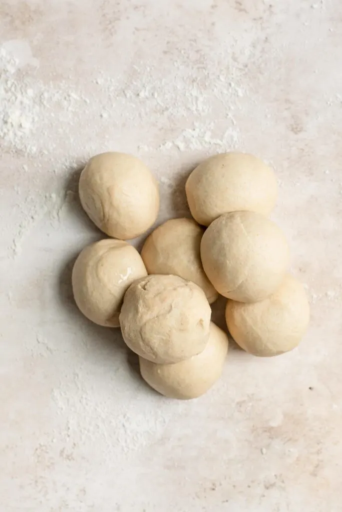eight dough balls on counter