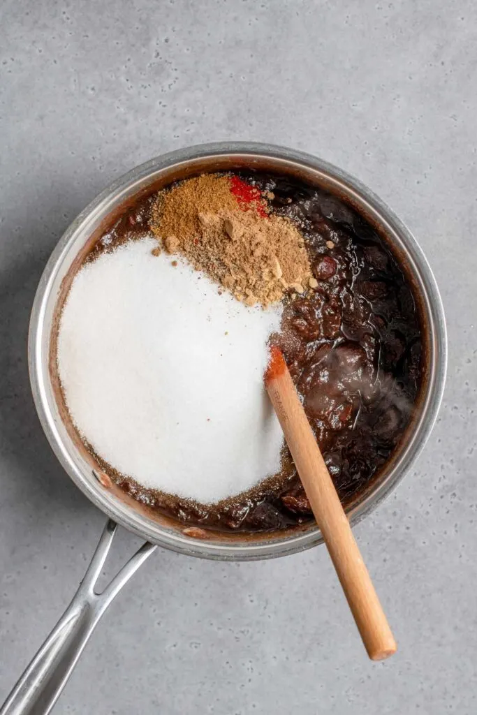 sugar and spices added to cooked and softened tamarind pulp