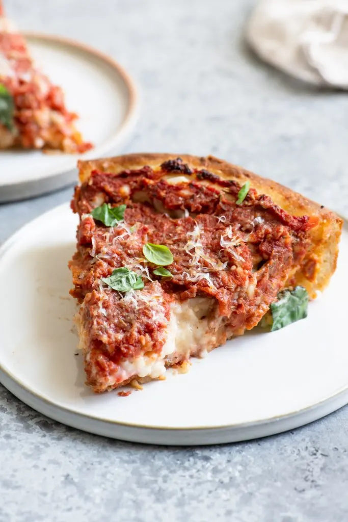 slices of deep dish pizza on a plate