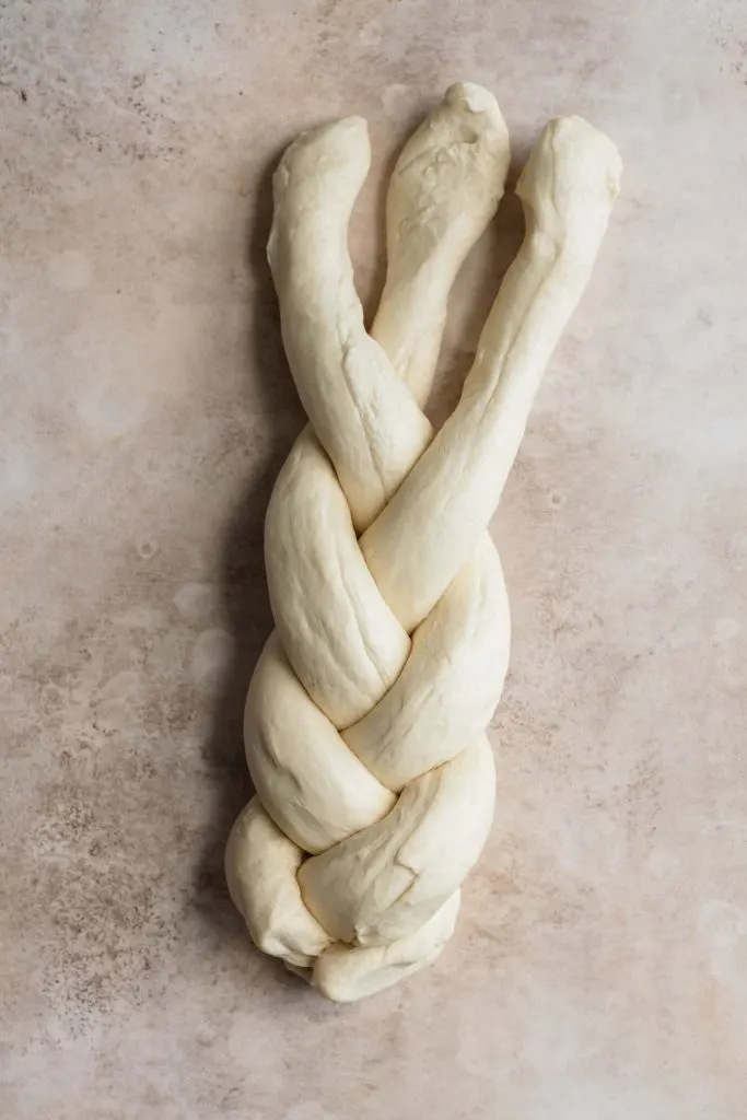 bottom 2/3 of loaf braided with end sealed