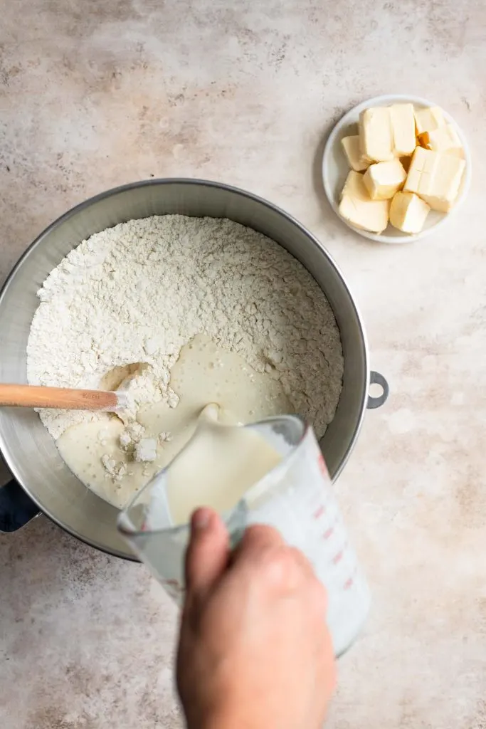 pouring in blended silken tofu and milk mixture