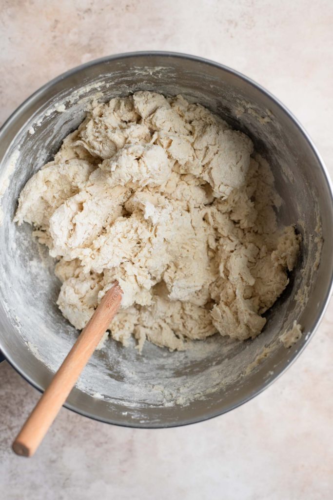 shaggy dough mixed with wooden spoon