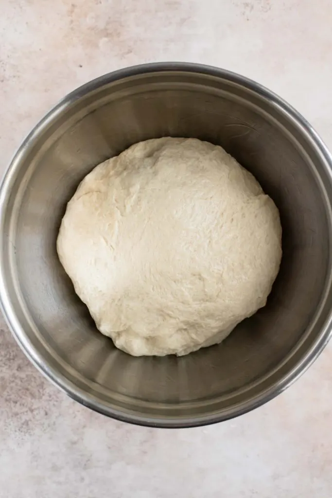dough shaped into a ball before proving