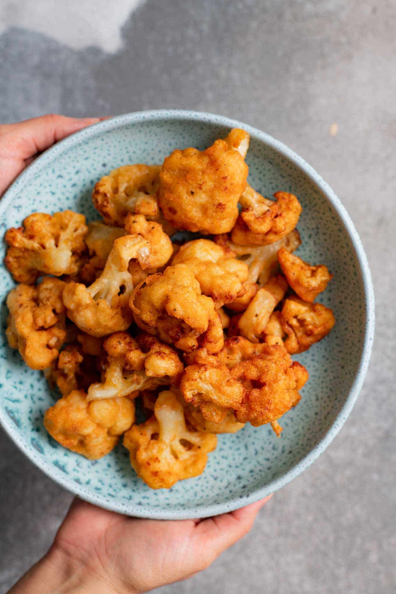 fried gobi in a blue bowl