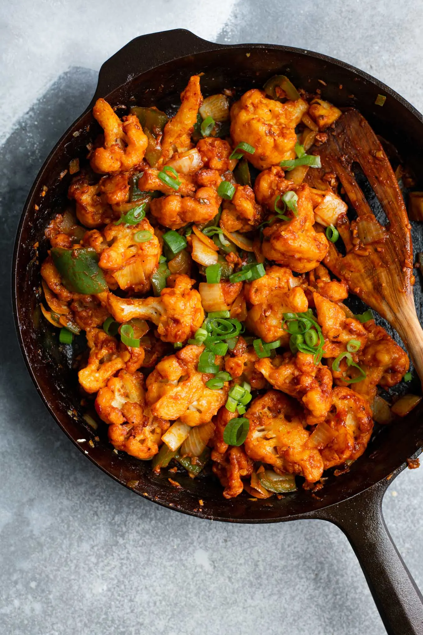 gobi manchurian mixed together in a large skillet