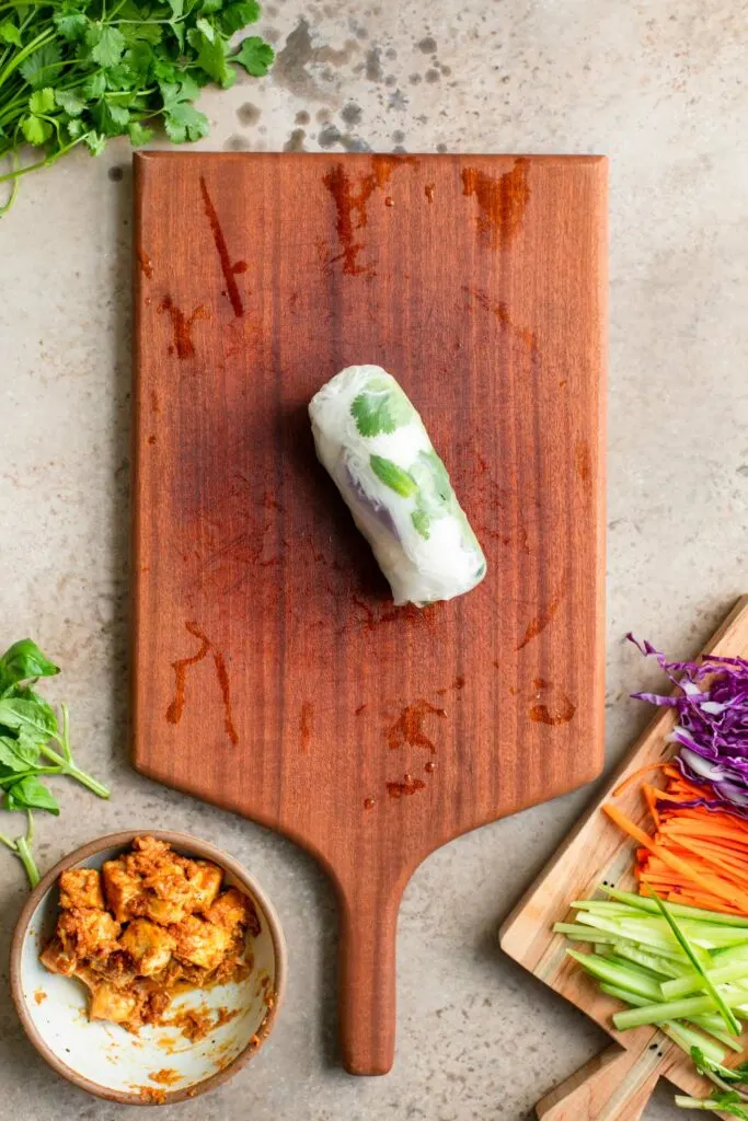 spring roll wrapped on cutting board