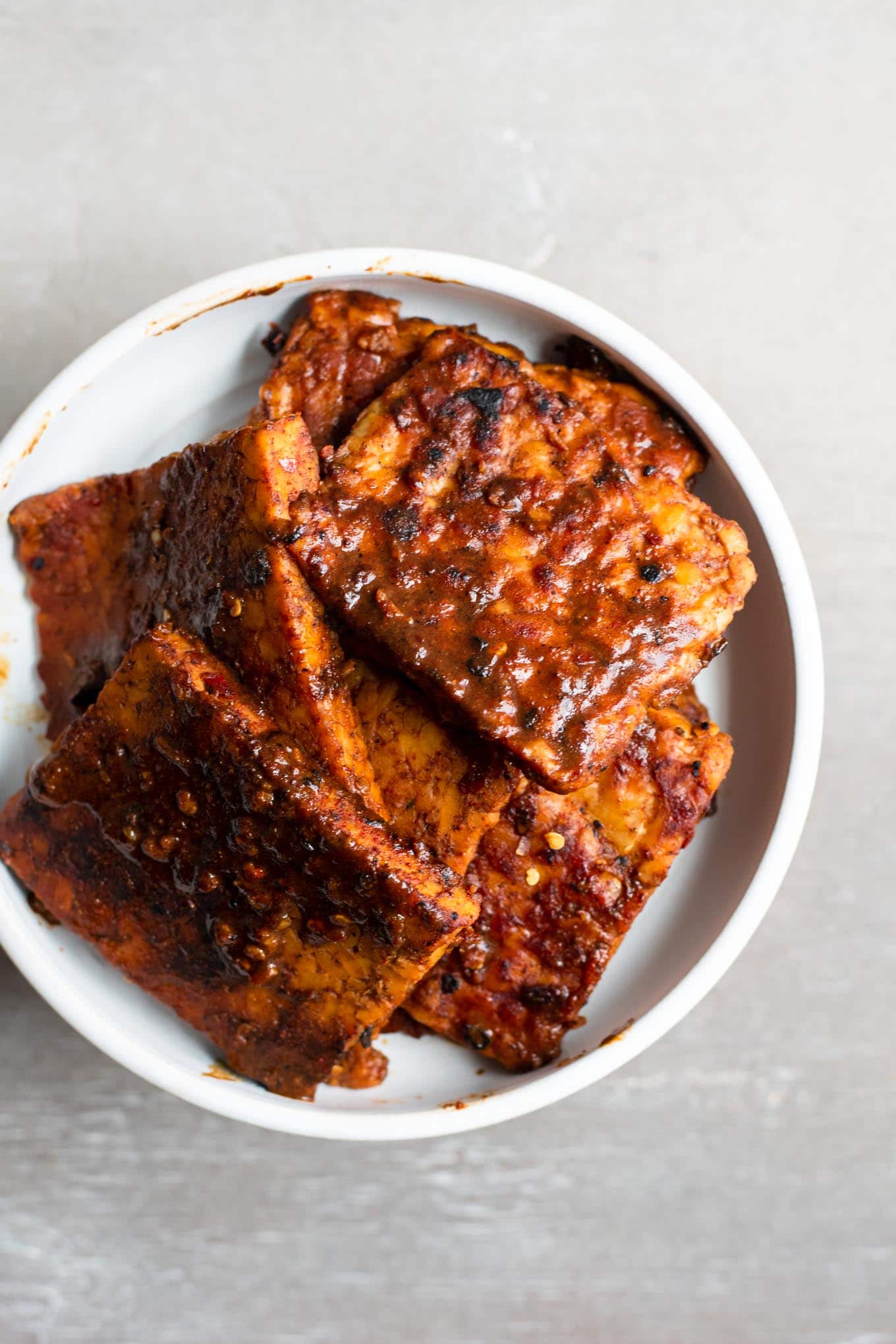 saucy cooked corned tempeh on a plate