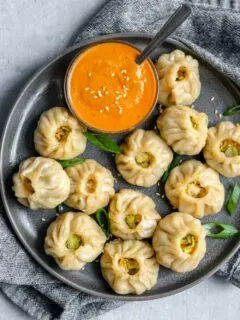 Tibetan Vegetable Momos served with Spicy Sesame Tomato Chutney