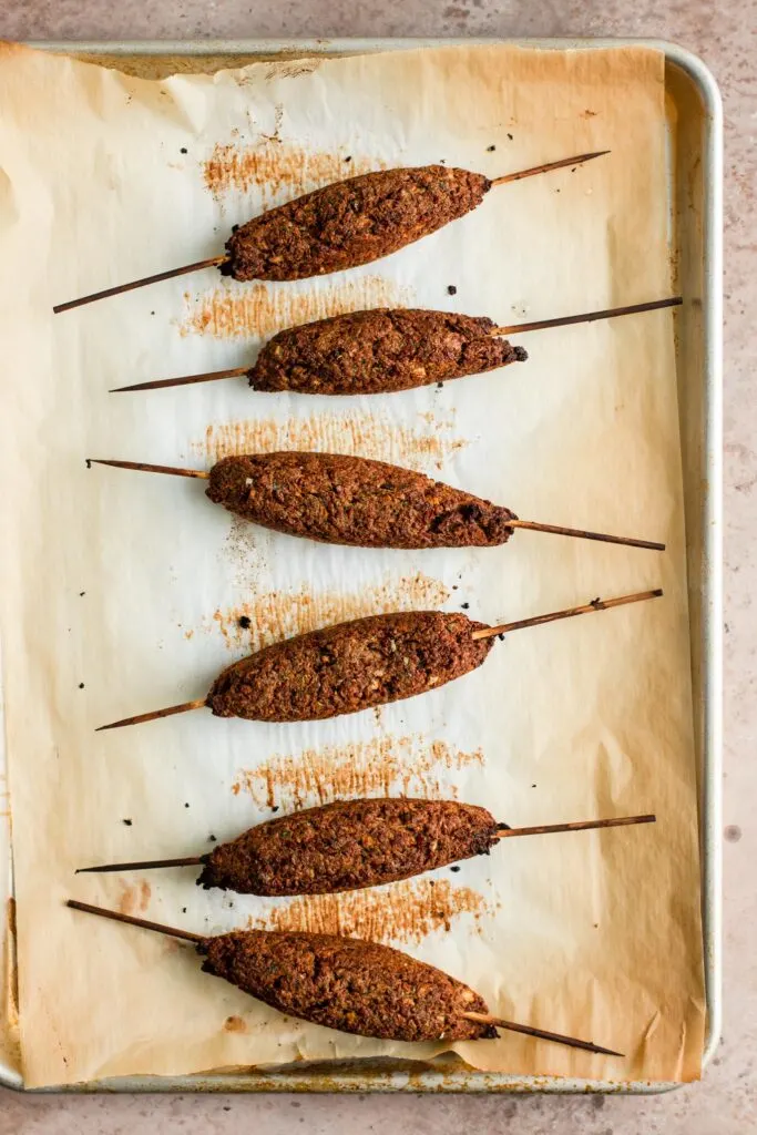 baked vegan sheekh kababs on a baking tray