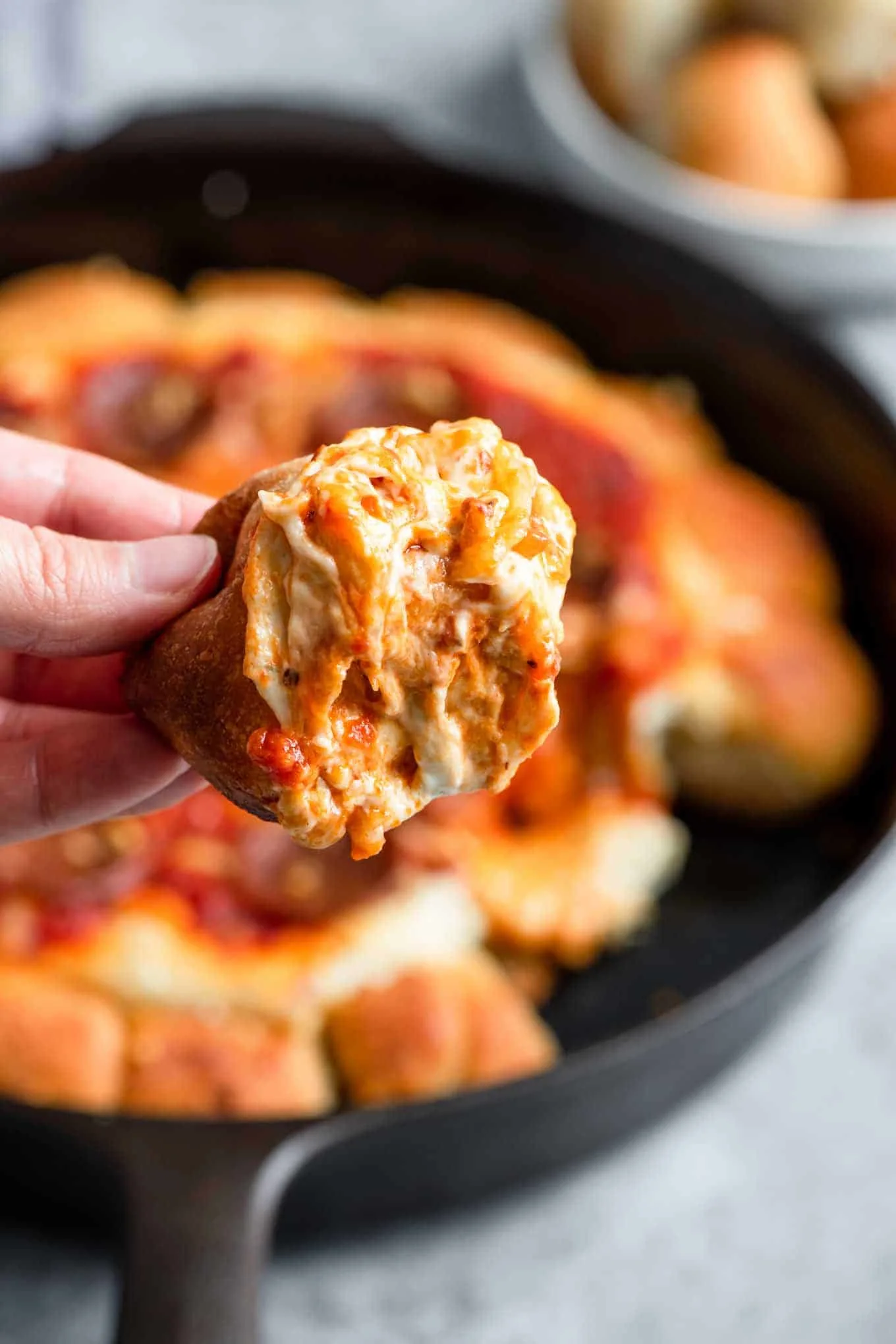 close up shot of the dip on a garlic roll