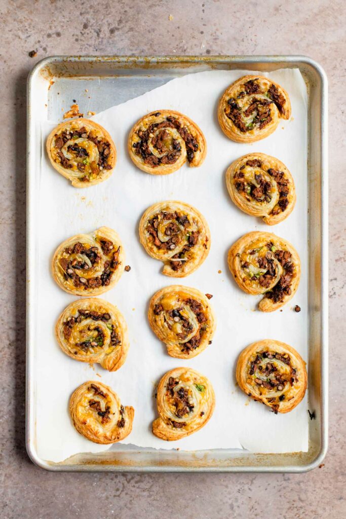 baked vegan pinwheels on baking tray