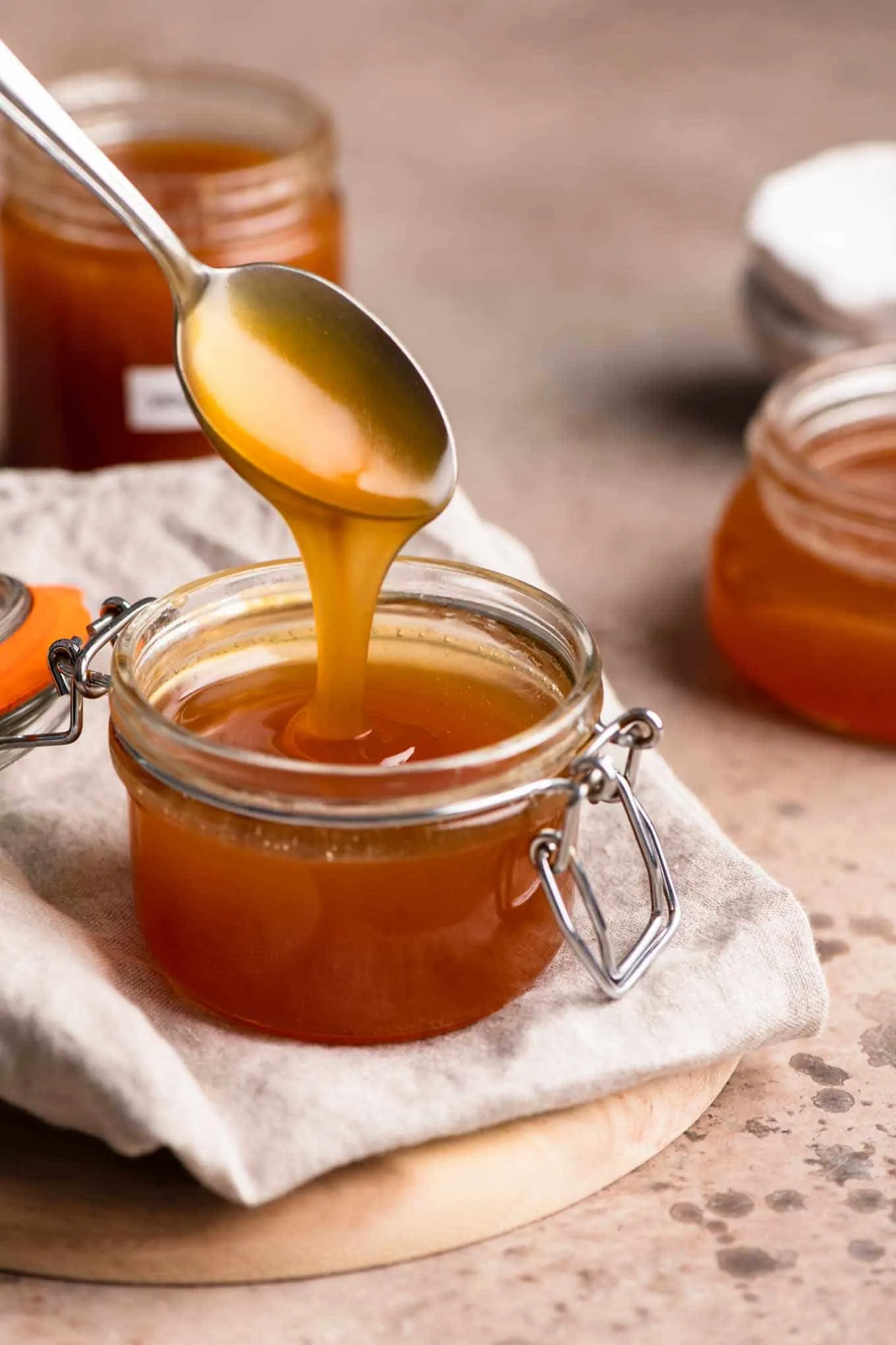 vegan caramel sauce in three glass jars