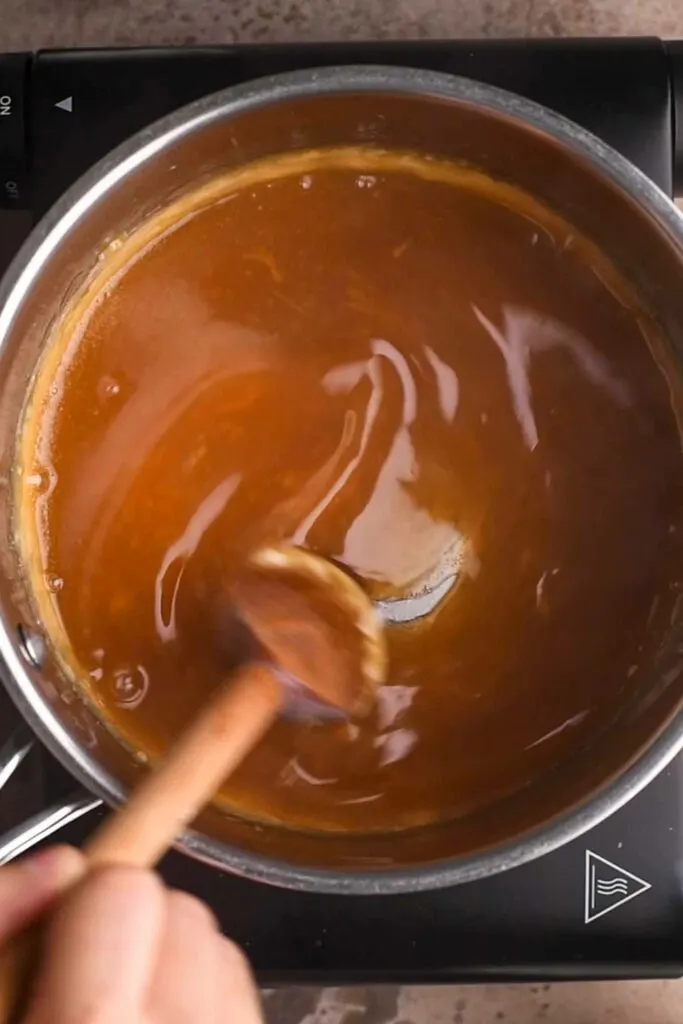 hot vegan caramel sauce in pot