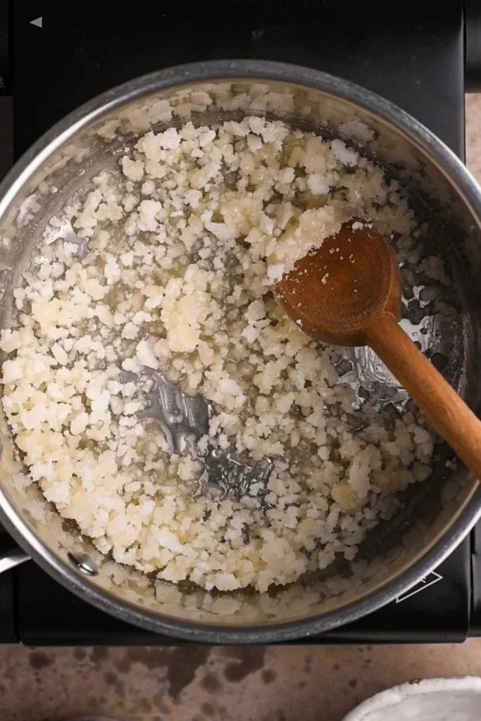 sugar clumping in pot and starting to turn pale golden