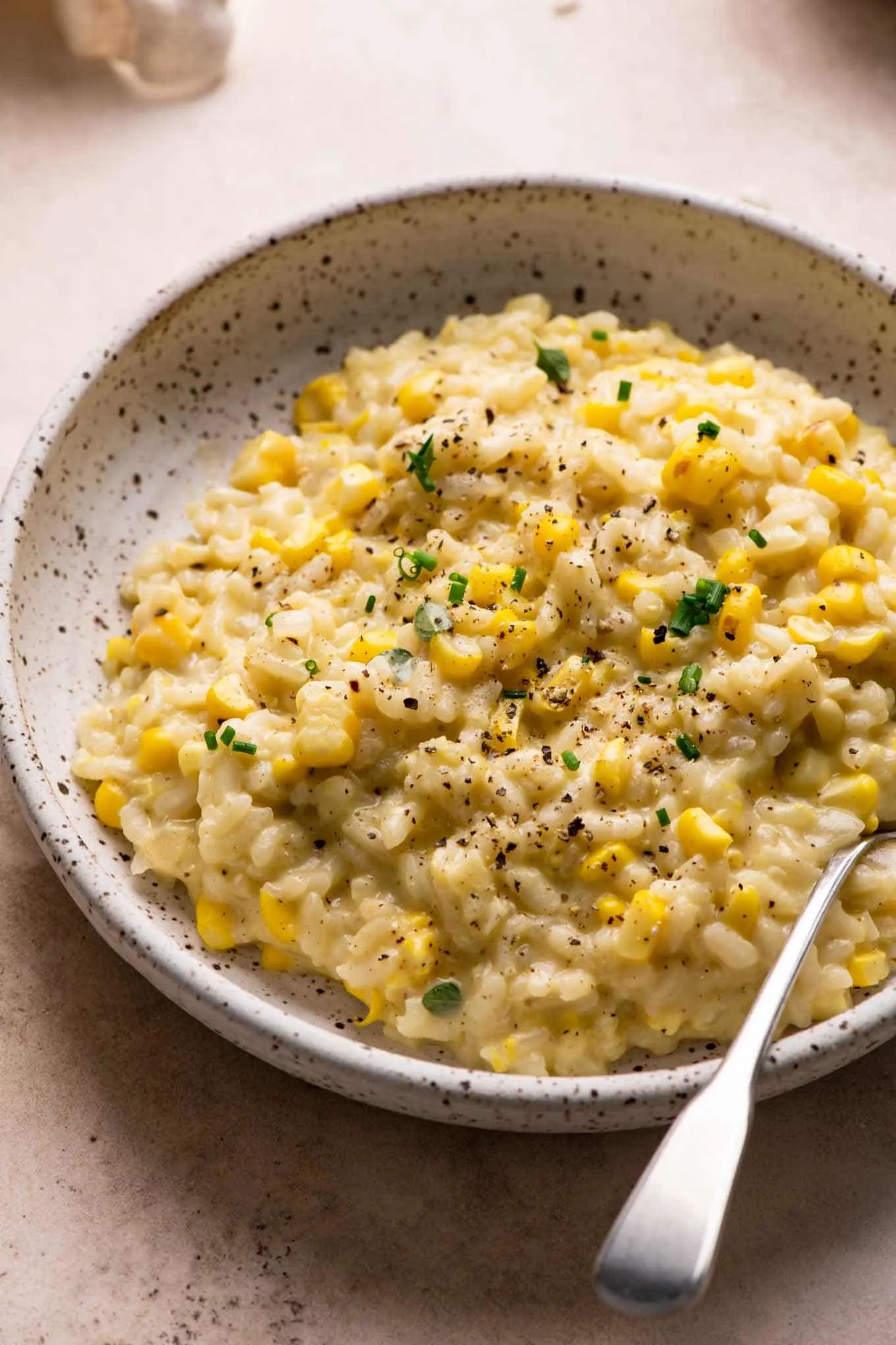 corn risotto in shallow bowl