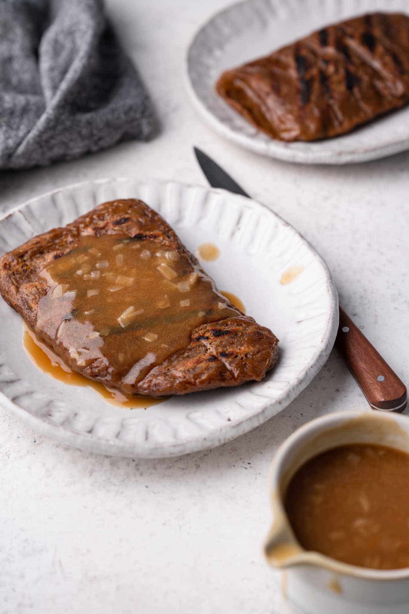 vegan seitan steaks topped with gravy