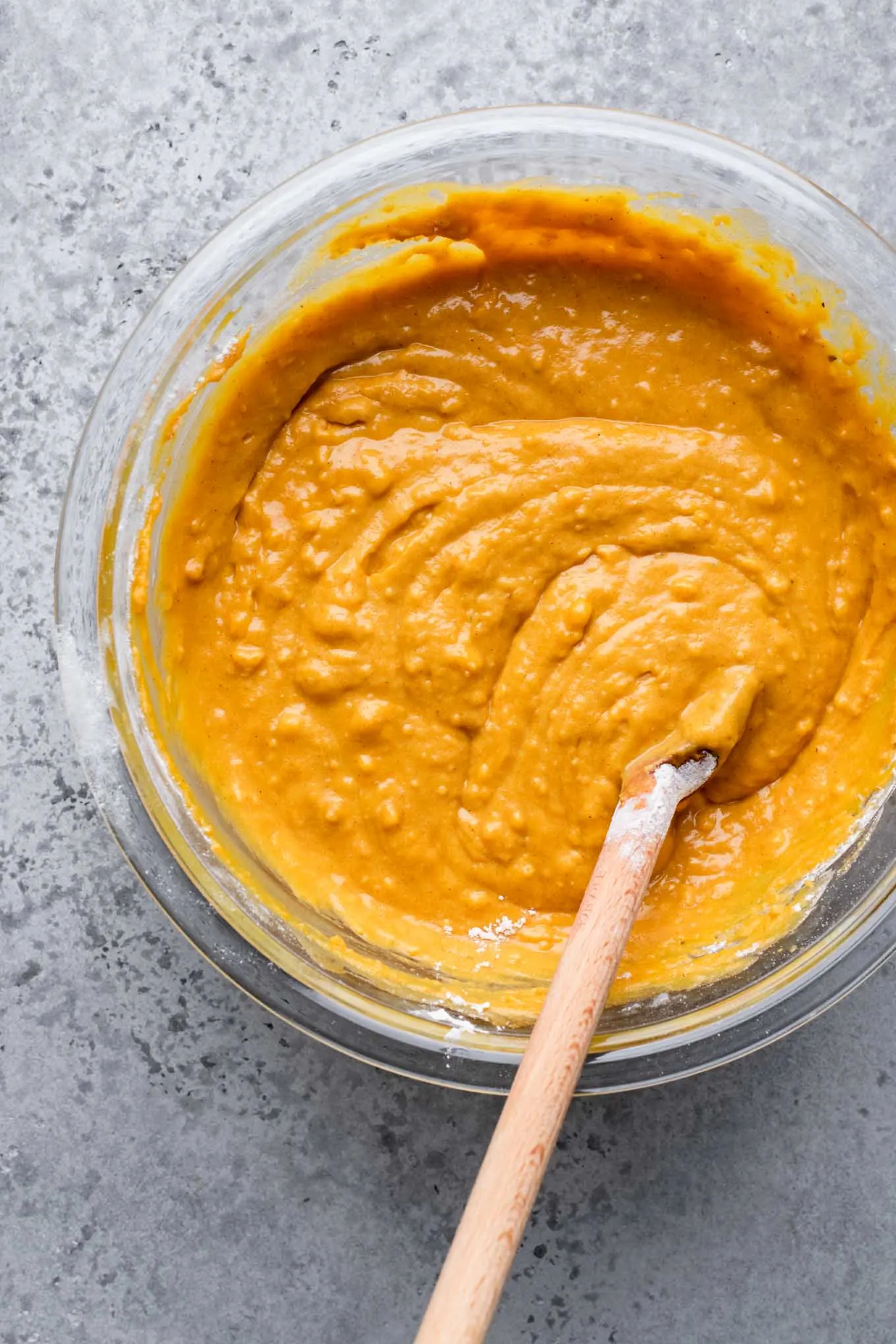 pumpkin muffin batter in mixing bowl