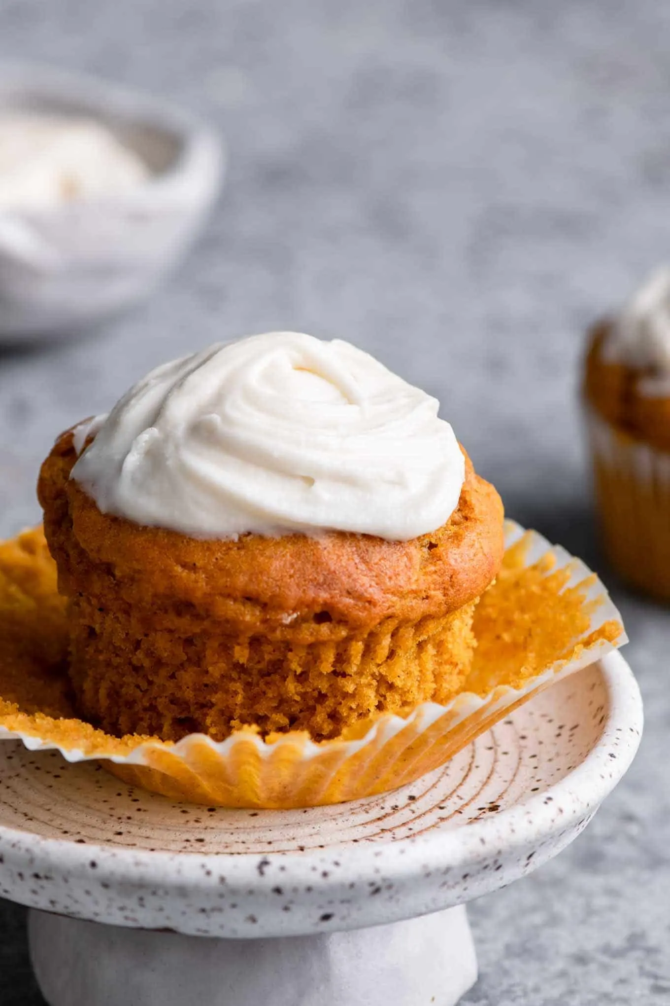 pumpkin muffin with wrapper peeled off