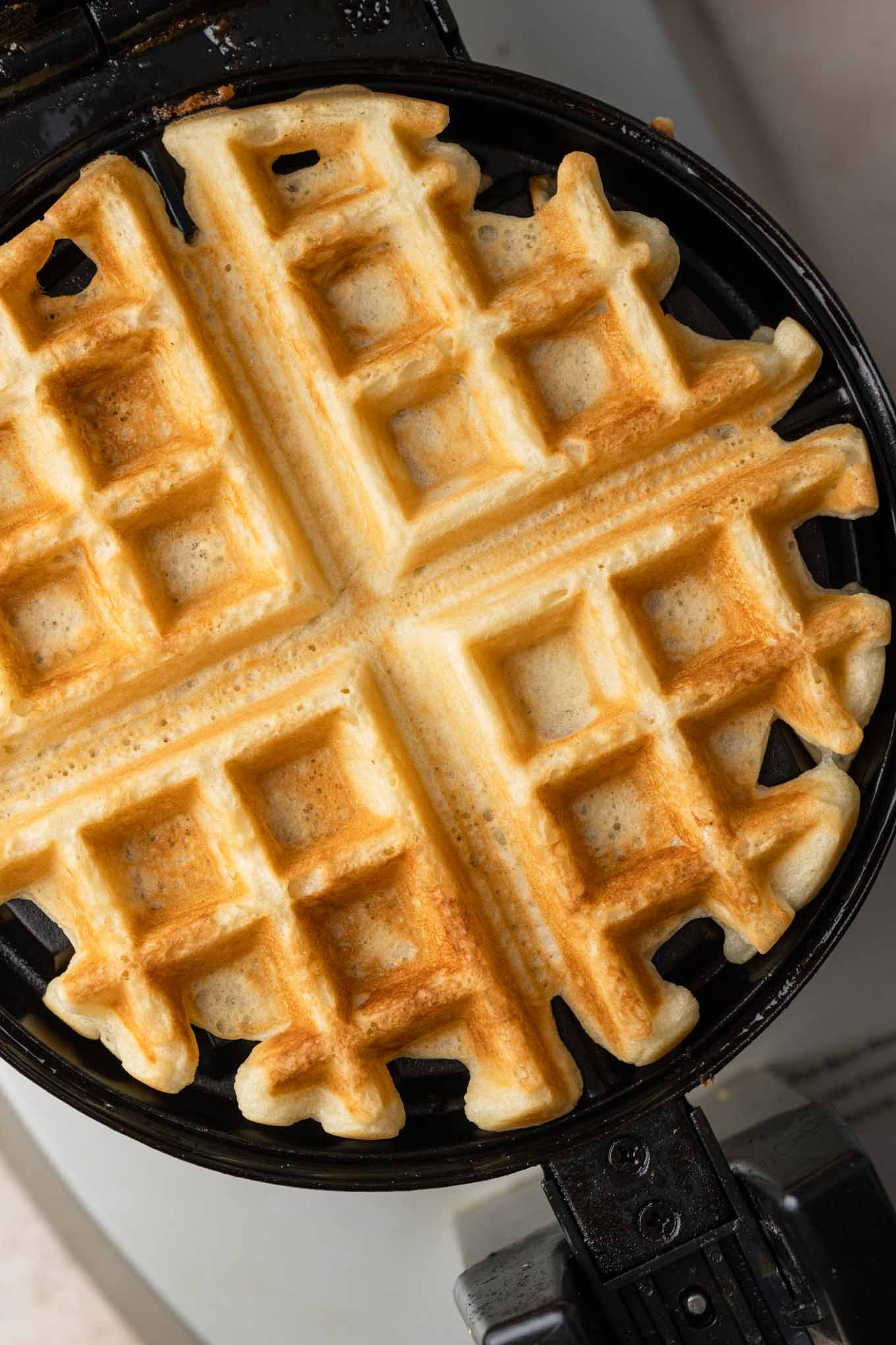 vegan belgian waffle in a waffle iron