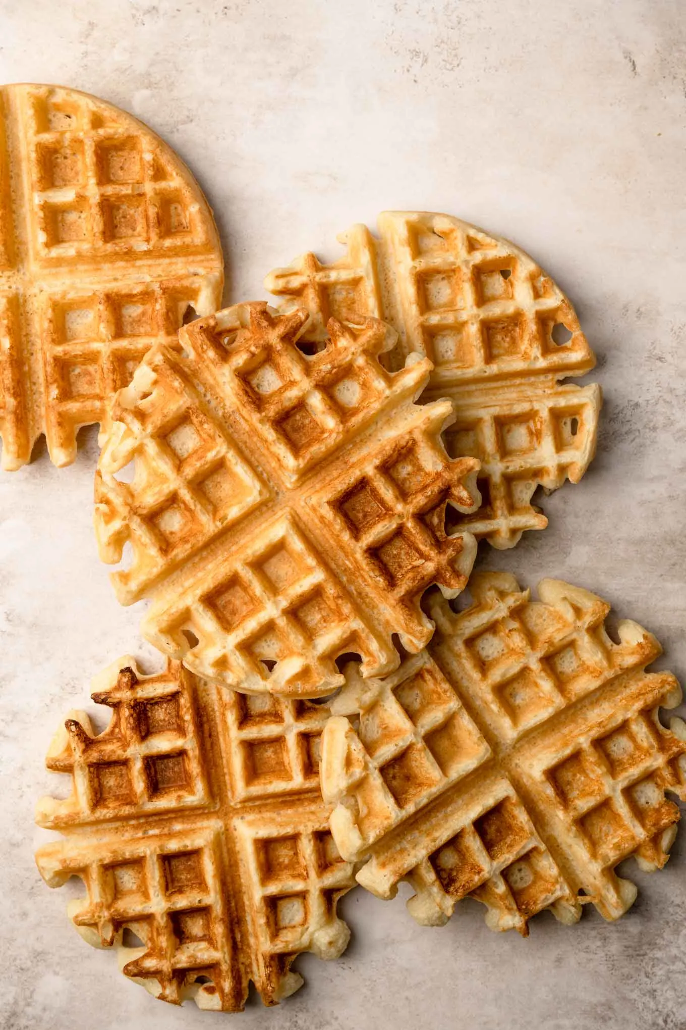 5 belgian waffles arranged on the counter