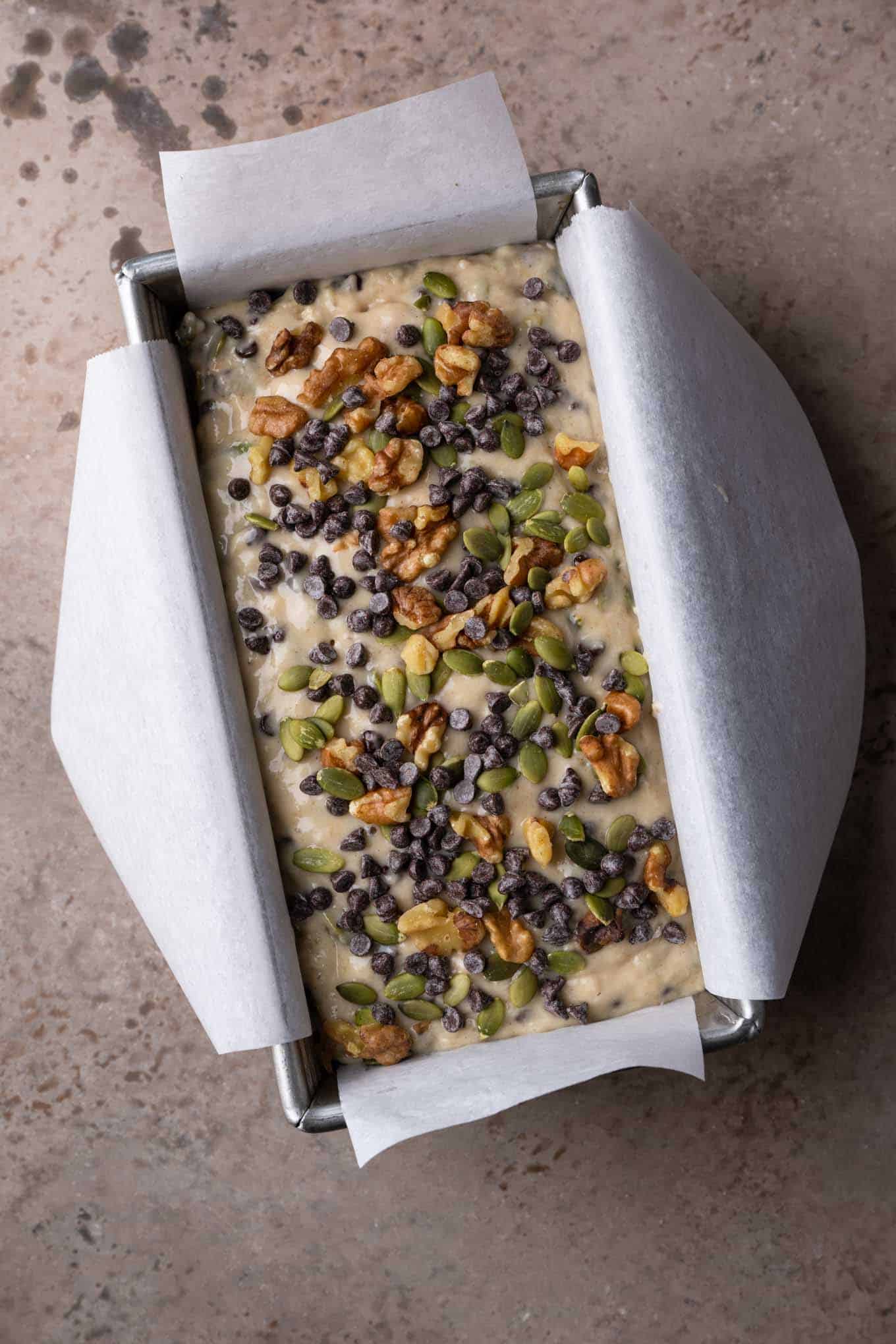 chocolate chip banana nut bread in a loaf pan before baking